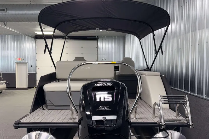 Slide: The Image of 2026 Sylvan Mirage 8520 CLZ DH PTS Tritoon with Mercury engine in showroom. - 24