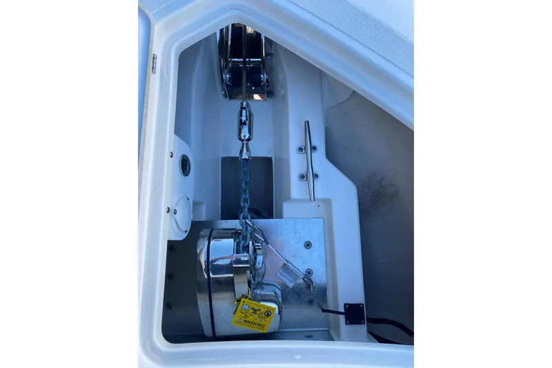 Slide: The Image of Anchor chain compartment of 2020 Pursuit S 288 Sport boat. - 19