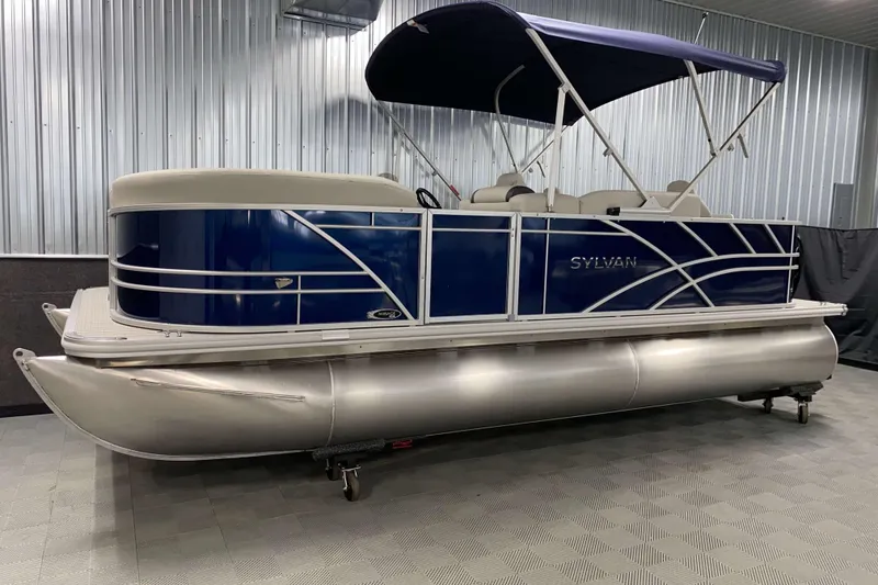 Slide: The Image of 2026 Sylvan Mirage Fish 8520 Party Fish pontoon boat in showroom. - 15