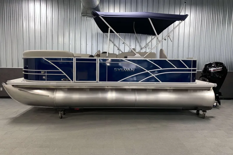 Slide: The Image of 2026 Sylvan Mirage Fish 8520 Party Fish pontoon boat in showroom. - 18