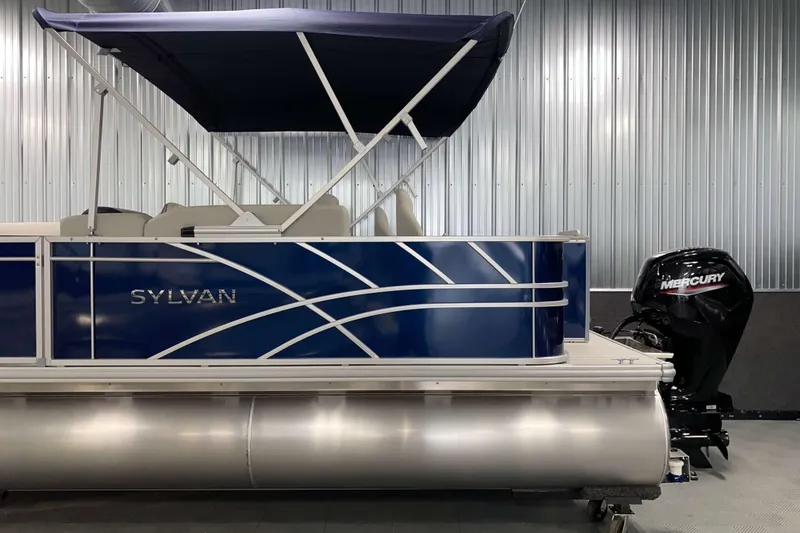 Slide: The Image of 2026 Sylvan Mirage Fish 8520 Party Fish pontoon boat with Mercury outboard motor. - 19