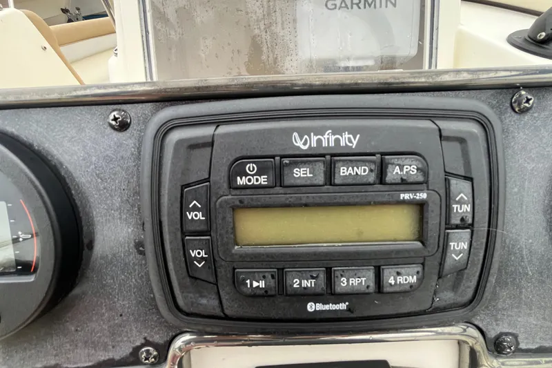 Slide: The Image of Infinity audio system on 2015 Scout 210 Dorado boat dashboard. - 34
