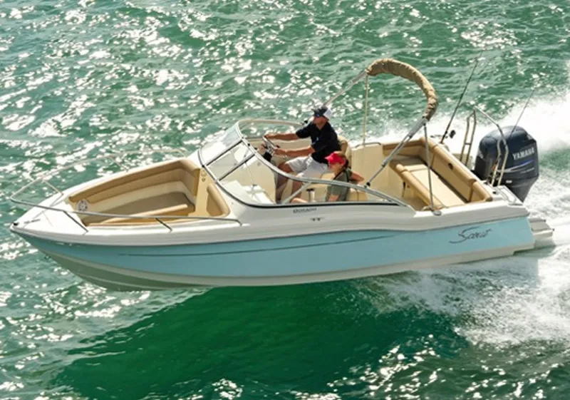 Slide: The Image of Manufacturer Provided Image: 2015 Scout 210 Dorado boat cruising on water. - 38