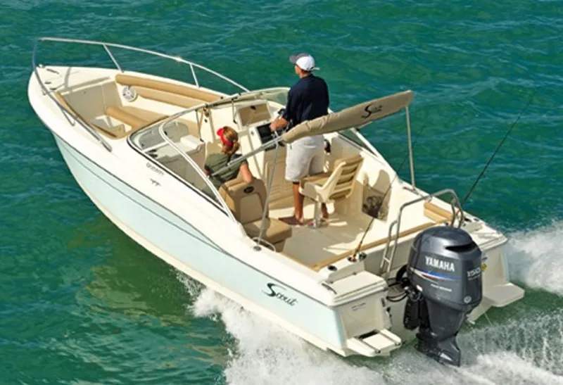Slide: The Image of Manufacturer Provided Image: 2015 Scout 210 Dorado boat cruising on water with Yamaha outboard motor. - 40