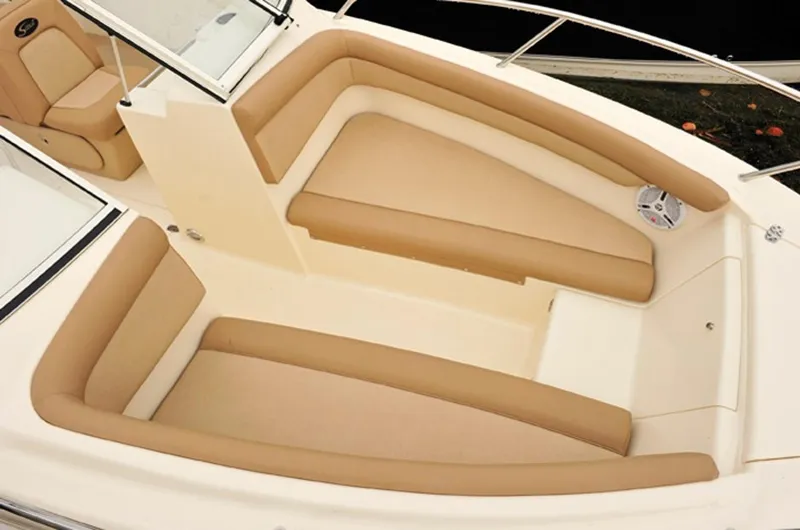Slide: The Image of Manufacturer Provided Image: 2015 Scout 210 Dorado boat interior with beige seating and white accents. - 42