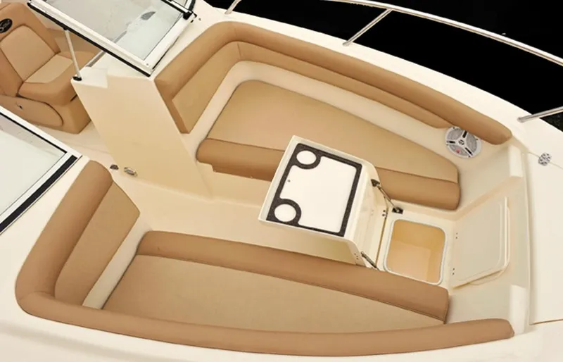 Slide: The Image of Manufacturer Provided Image: 2015 Scout 210 Dorado boat interior with beige seating and storage compartments. - 43