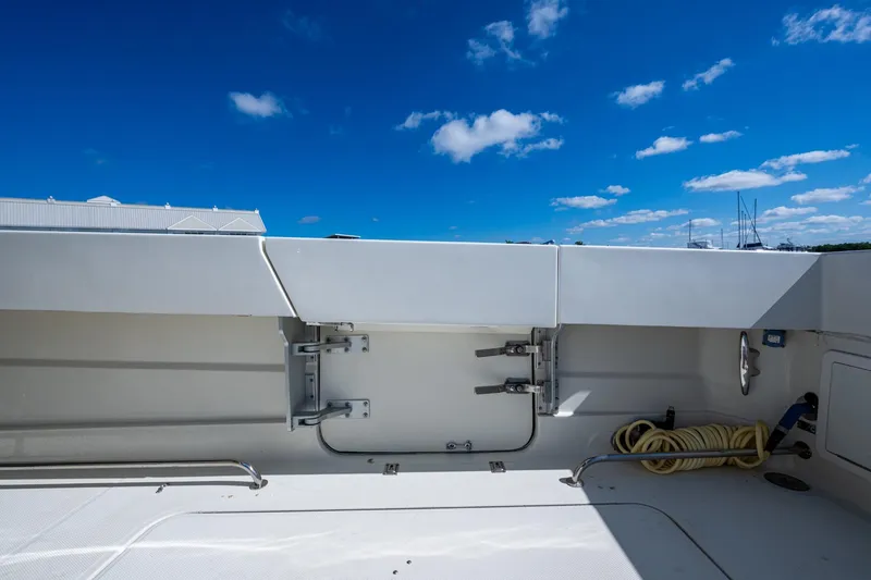 Slide: The Image of 2018 HCB 42 Siesta boat detail with blue sky background. - 19