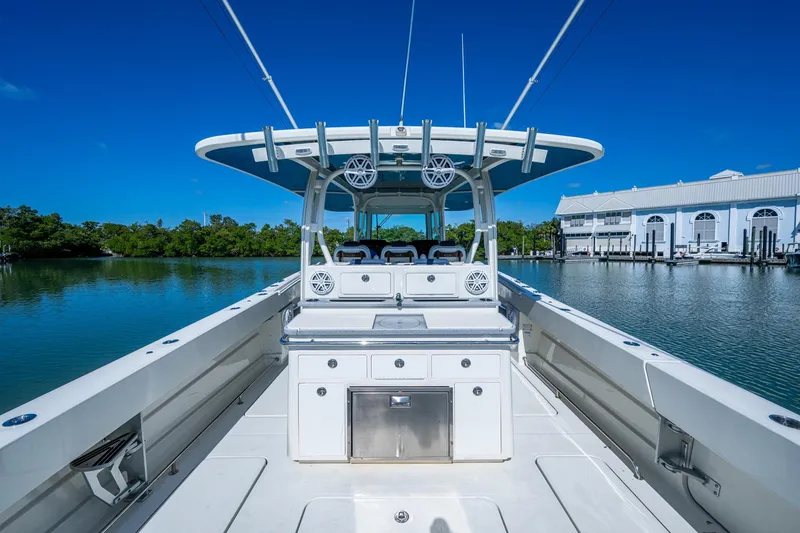 Slide: The Image of 2018 HCB 42 Siesta boat deck with clear blue sky background. - 20