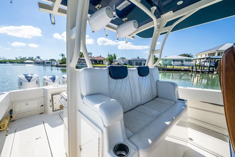 Slide: The Image of 2018 HCB 42 Siesta boat deck with speakers and storage compartment. - 23