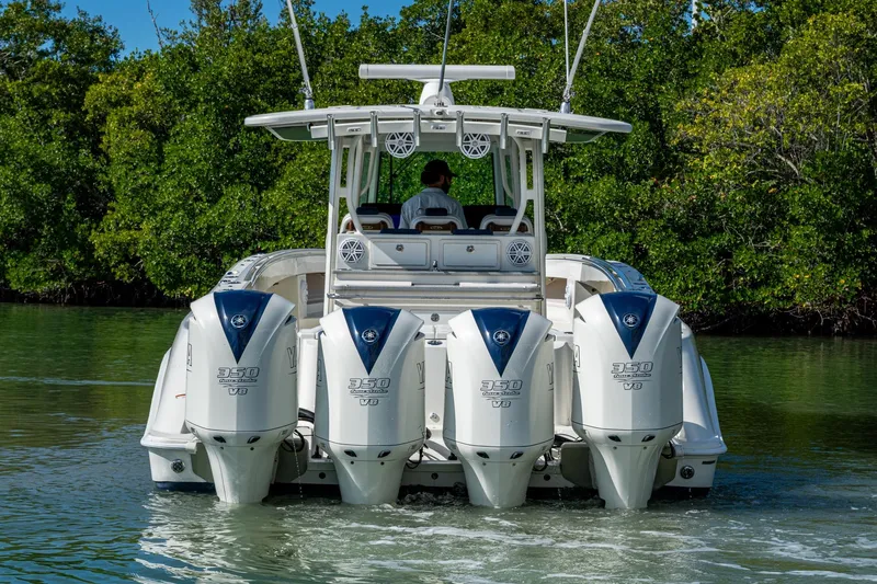 Slide: The Image of 2018 HCB 42 Siesta boat with four Yamaha 350 V8 engines on water. - 53