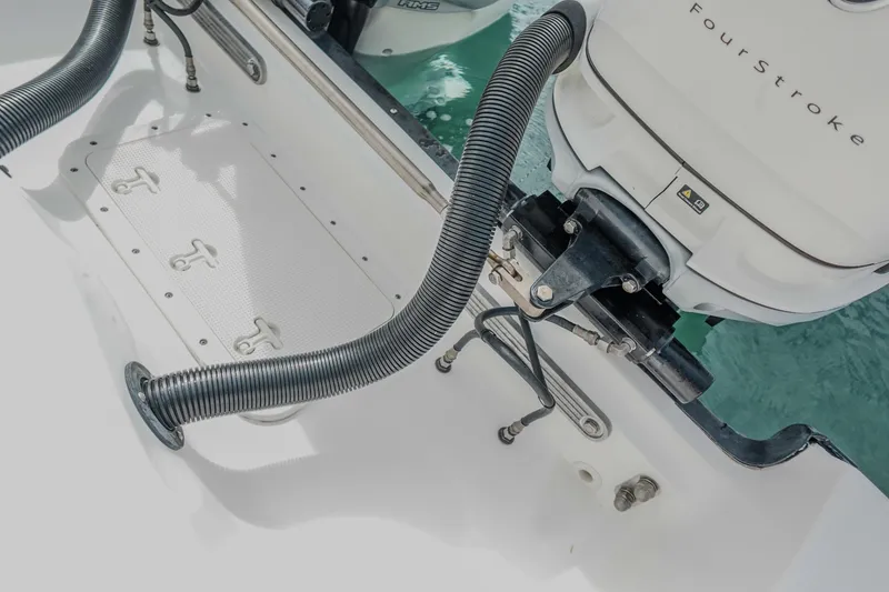 Slide: The Image of 2007 Boston Whaler 305 Conquest boat engine and deck details. - 20