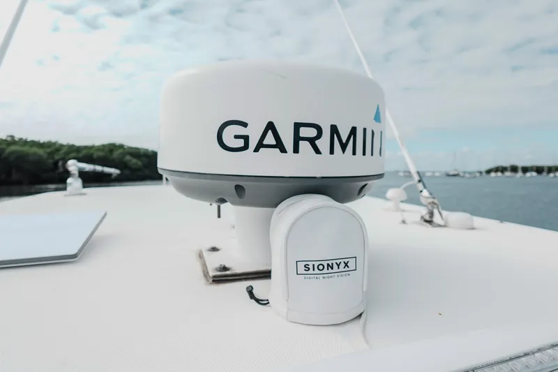 Slide: The Image of Garmin radar and SIONYX night vision on 2007 Boston Whaler 305 Conquest boat deck. - 43