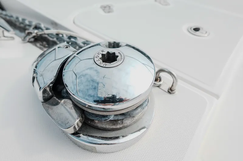 Slide: The Image of Close-up of a 2007 Boston Whaler 305 Conquest boat's anchor winch mechanism. - 46