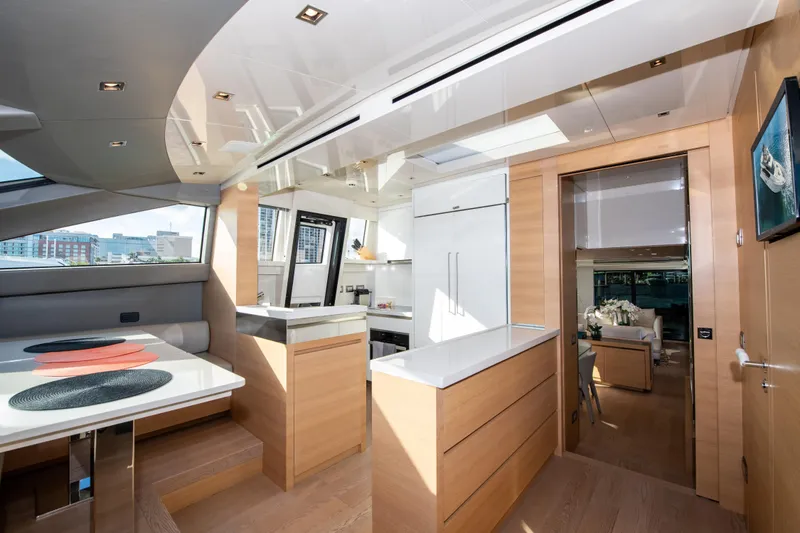 Slide: The Image of Luxurious interior of 2016 Sanlorenzo SL86 yacht with modern kitchen and dining area. - 17