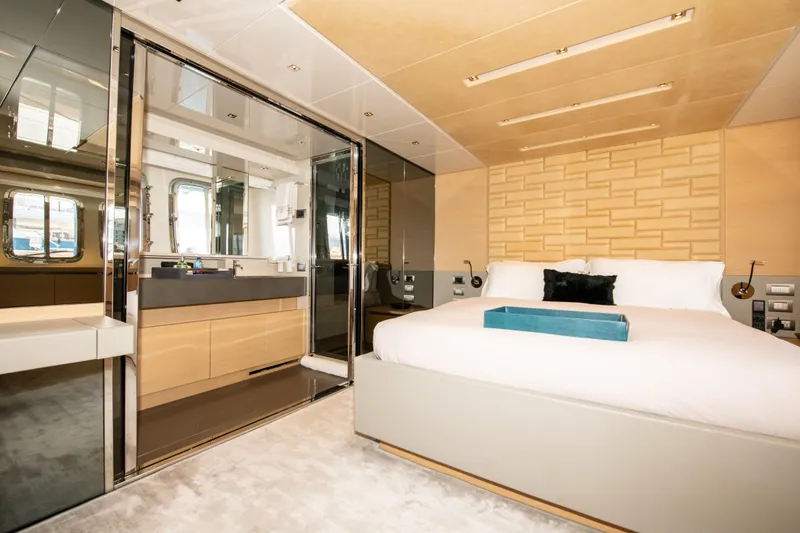 Slide: The Image of Luxurious bedroom interior of 2016 Sanlorenzo SL86 yacht with modern design elements. - 23