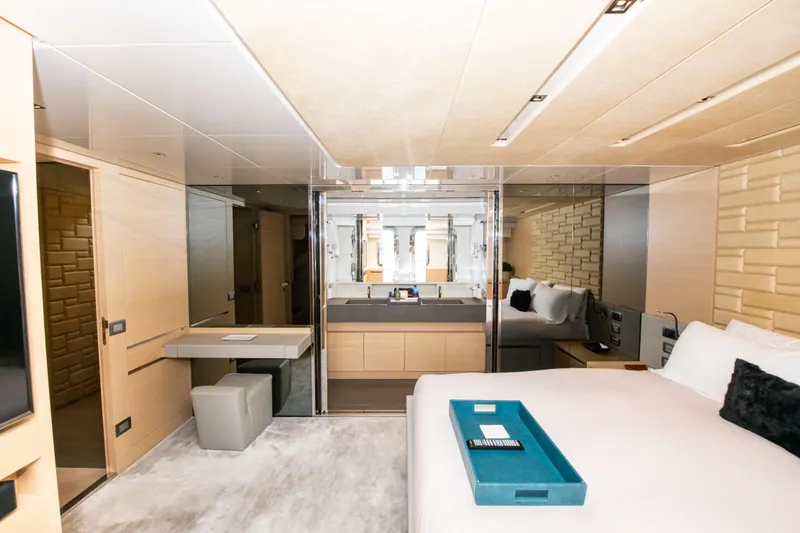 Slide: The Image of Luxurious interior of 2016 Sanlorenzo SL86 yacht, featuring modern bedroom and sleek design elements. - 24