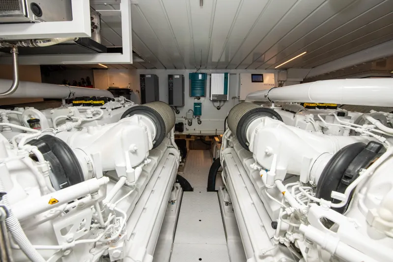 Slide: The Image of Engine room of 2016 Sanlorenzo SL86 yacht, showcasing dual engines and mechanical systems. - 27