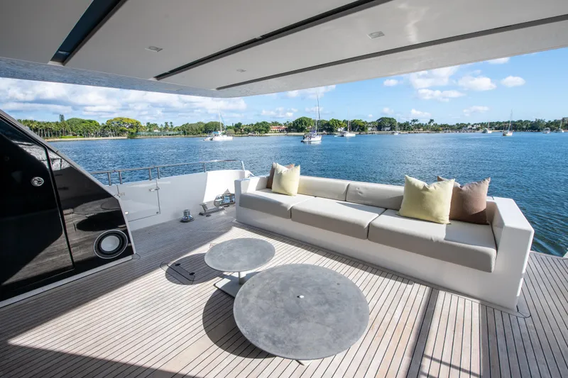 Slide: The Image of Luxurious 2016 Sanlorenzo SL86 yacht deck with elegant seating and scenic water view. - 9