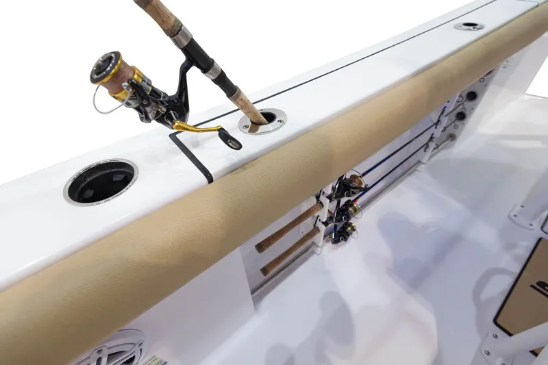 Slide: The Image of 2021 Sportsman Open 242 Center Console boat interior with blue lighting and stainless steel fixtures. - 13