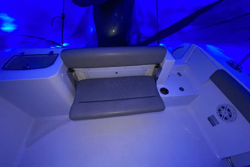 Slide: The Image of 2021 Sportsman Open 242 Center Console boat interior with blue LED lighting. - 20
