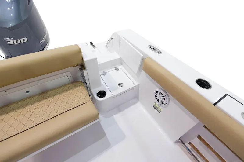 Slide: The Image of Manufacturer Provided Image: 2021 Sportsman Open 242 Center Console boat interior with seating and Yamaha 300 engine. - 35