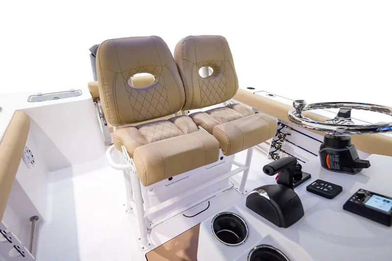 Slide: The Image of 2021 Sportsman Open 242 Center Console dashboard with dual digital displays and controls. - 9