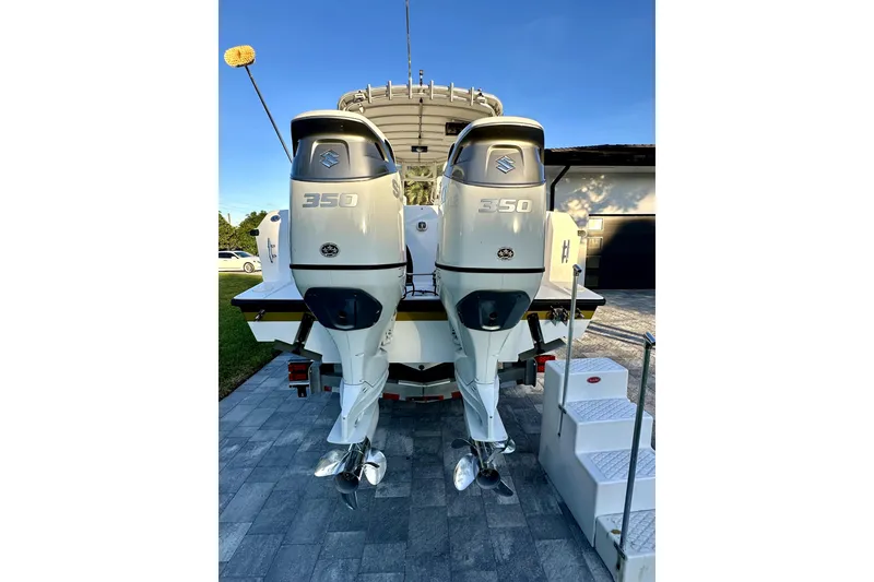 Slide: The Image of 2006 Contender 35 Express Side Console with twin 350 horsepower outboard engines. - 23