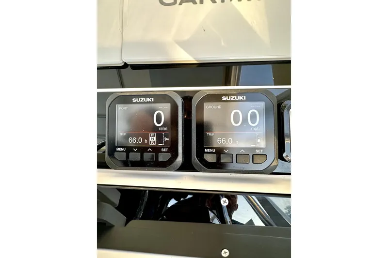 Slide: The Image of Digital display on 2006 Contender 35 Express Side Console boat dashboard. - 9