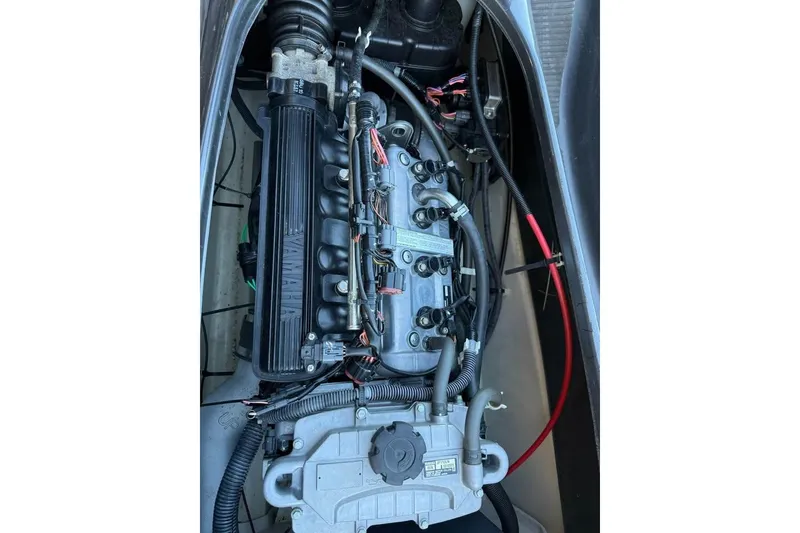 Slide: The Image of 2013 Yamaha WaveRunner VXR engine compartment, showcasing detailed internal components. - 5