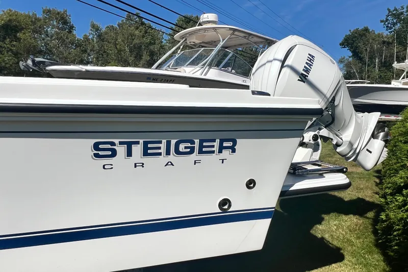 Slide: The Image of 2026 Steiger Craft 23 DV Miami boat with Yamaha engine, side view. - 7