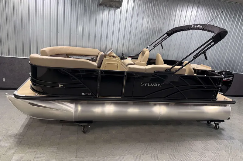 The Image of 2026 Sylvan Mirage 8520 Party Fish pontoon boat in showroom, featuring sleek design and comfortable seating. - 0