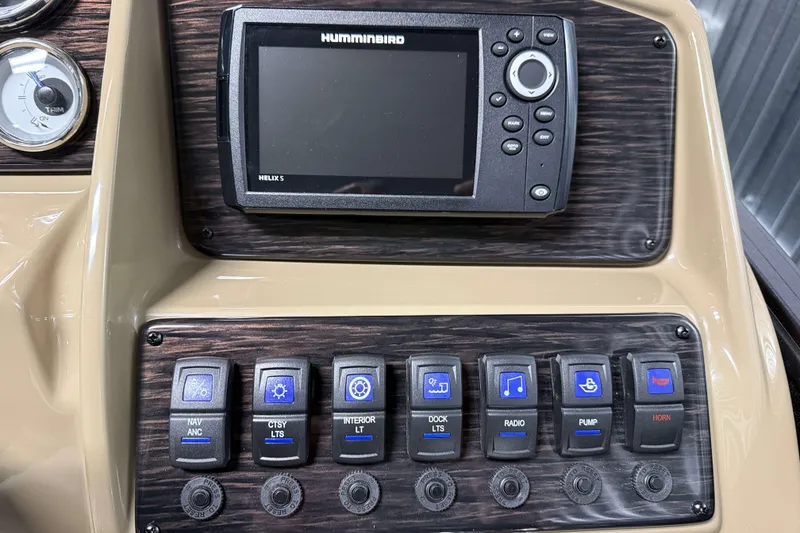 Slide: The Image of Control panel of 2026 Sylvan Mirage 8520 Party Fish with Humminbird Helix 5 display. - 13