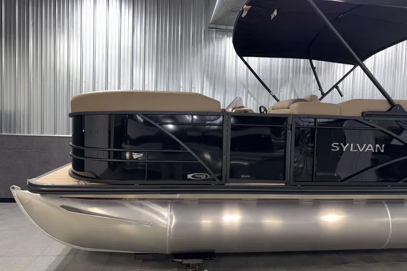 Slide: The Image of 2026 Sylvan Mirage 8520 Party Fish pontoon boat in showroom, side view. - 22