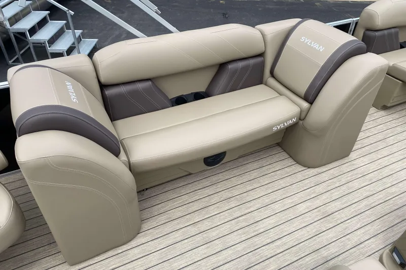 Slide: The Image of Open storage compartment on 2026 Sylvan Mirage 8520 Party Fish boat, featuring cup holders. - 5