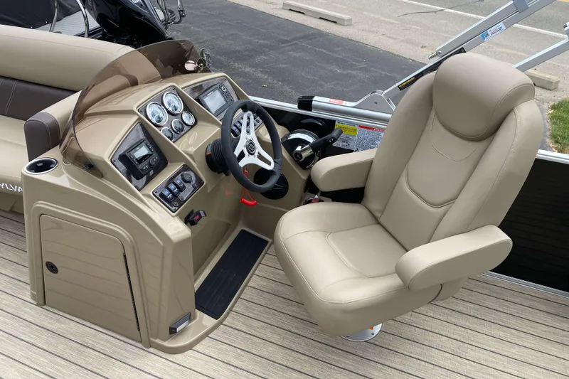 Slide: The Image of 2026 Sylvan Mirage 8520 Party Fish boat seating with cup holders, beige and brown upholstery. - 6