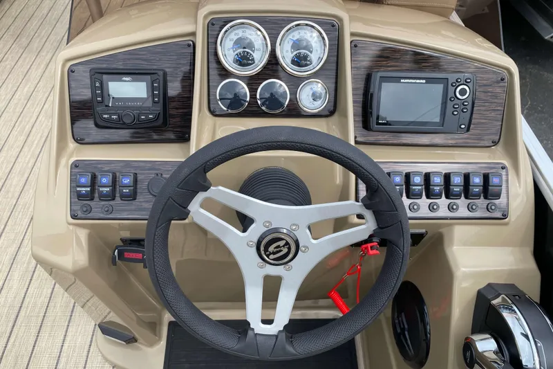 Slide: The Image of Captain's chair and helm of 2026 Sylvan Mirage 8520 Party Fish boat. - 7