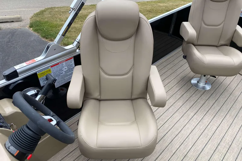 Slide: The Image of Captain's chair and steering wheel of 2026 Sylvan Mirage 8520 Party Fish boat. - 9