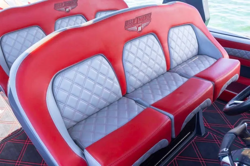 Slide: The Image of Luxury red and gray seating in 2022 Deep Impact 399 Sport boat. - 29
