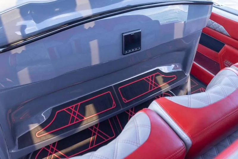 Slide: The Image of Interior of 2022 Deep Impact 399 Sport boat with red and gray seating. - 36