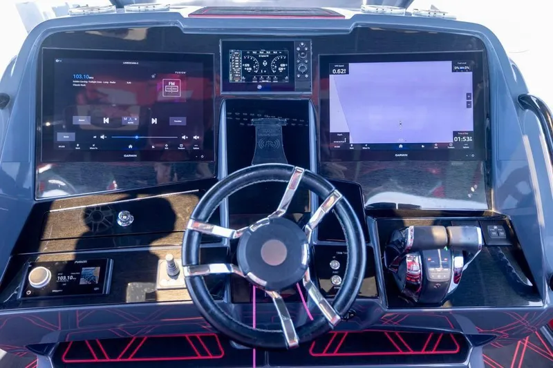 Slide: The Image of 2022 Deep Impact 399 Sport dashboard with advanced navigation and control systems. - 38
