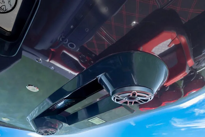 Slide: The Image of 2022 Deep Impact 399 Sport boat interior with sleek design and modern audio system. - 45