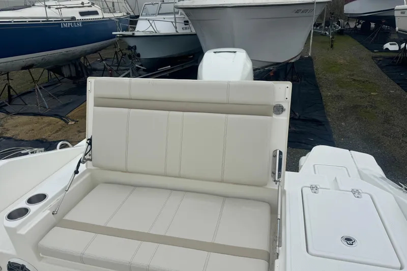 Slide: The Image of 2023 Boston Whaler 280 Dauntless boat with enclosed helm station. - 10
