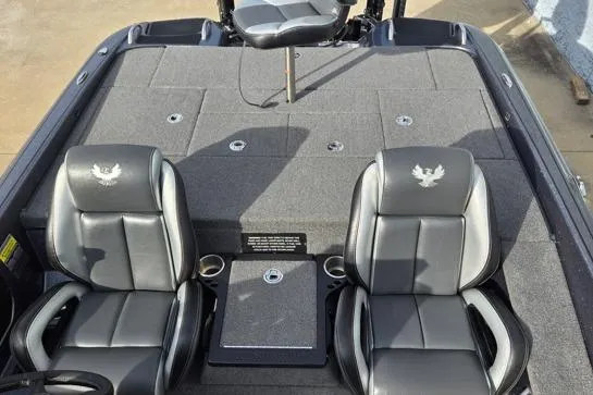 Slide: The Image of 2023 Phoenix 920 Elite boat interior with two leather seats and spacious deck layout. - 9