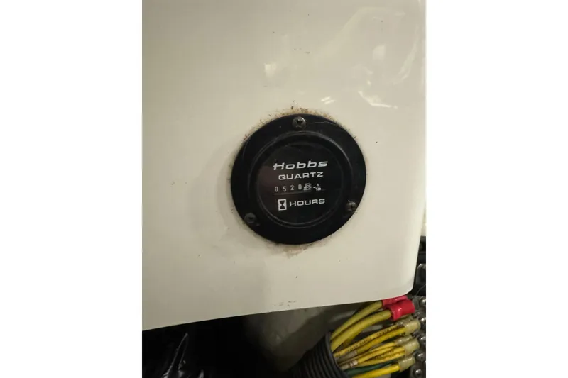 Slide: The Image of Hobbs Quartz hour meter on 2009 Cobalt 242 boat, displaying engine hours. - 15