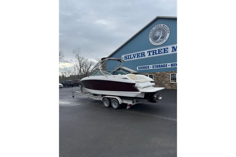 Slide: The Image of 2009 Cobalt 242 boat on trailer at Silver Tree Marine facility. - 3