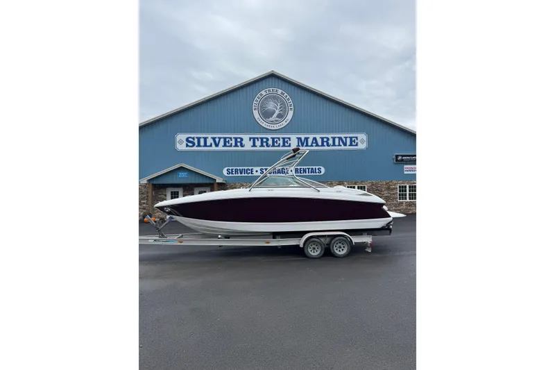 Slide: The Image of 2009 Cobalt 242 boat on trailer at Silver Tree Marine service center. - 4