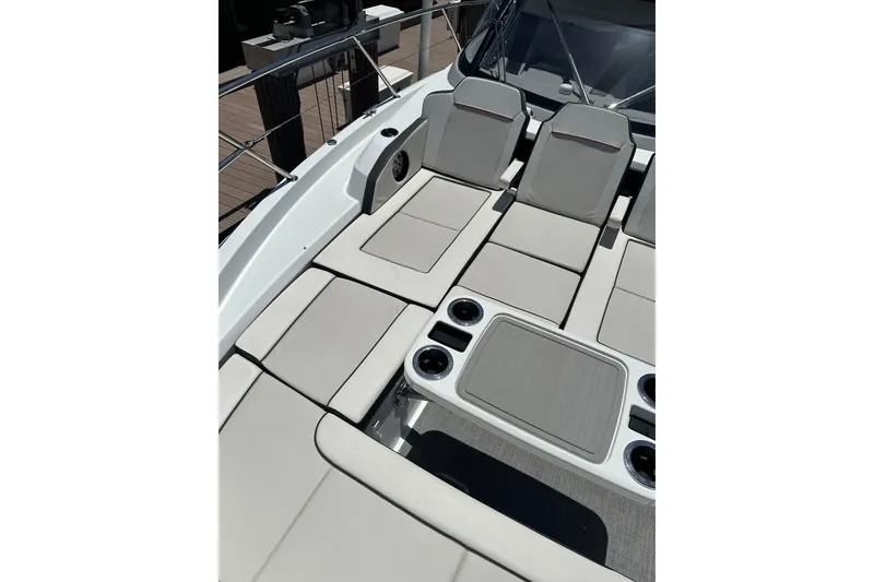 Slide: The Image of 2022 Jeanneau Leader 12.5 WA boat with spacious sunbathing deck and comfortable seating. - 12