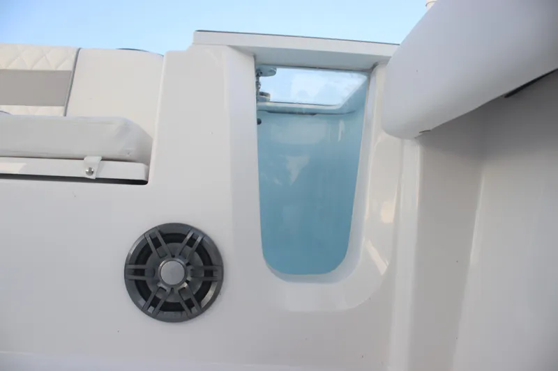 Slide: The Image of 2026 Sea Fox 228 Commander boat interior with speaker and seating detail. - 14