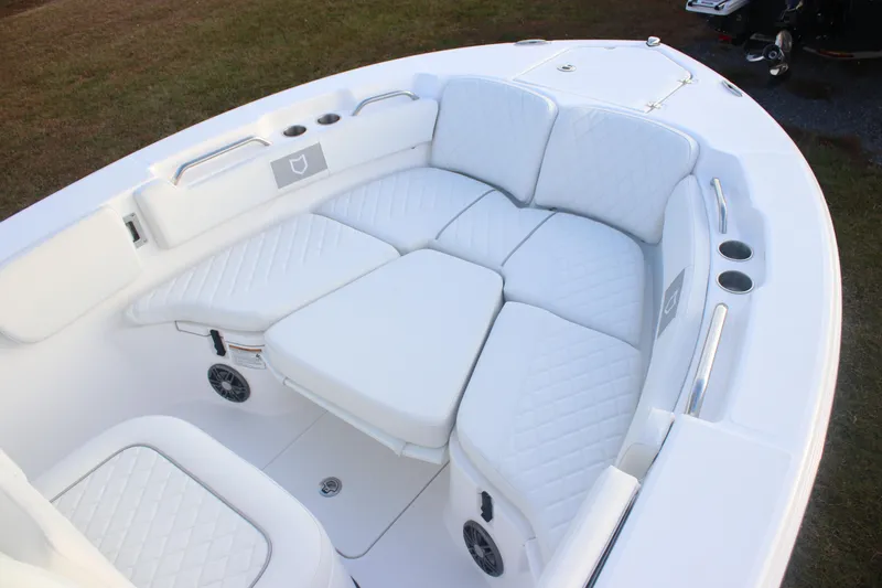 Slide: The Image of 2026 Sea Fox 228 Commander boat with luxurious white seating and cup holders. - 8