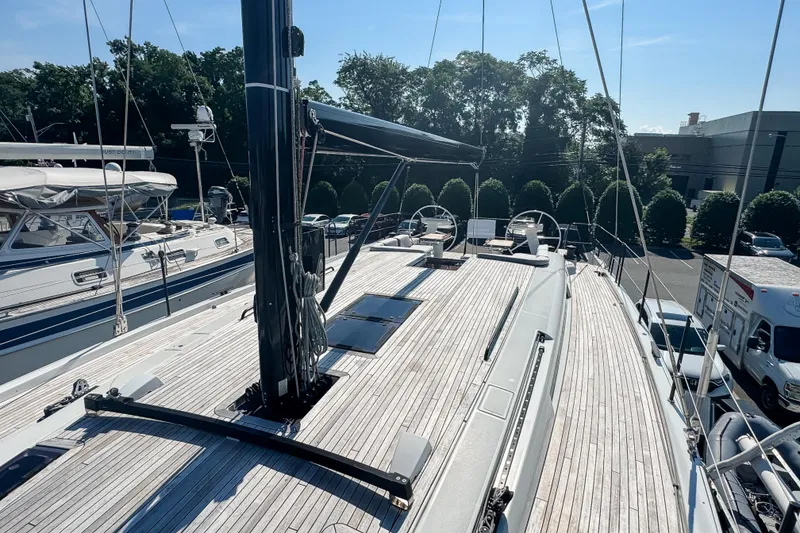 Slide: The Image of 2024 Beneteau First 53 sailboat deck with sleek design and modern features. - 12